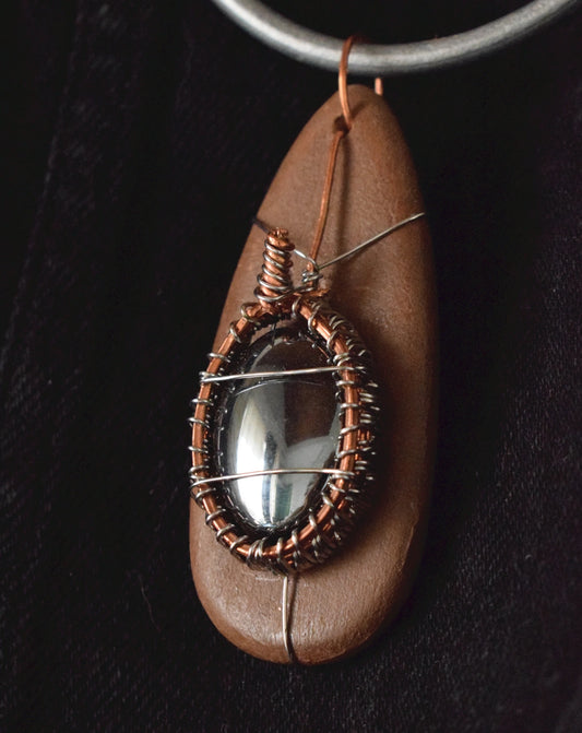 The Queen of Swords Pendant